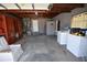 Garage with washer, dryer, and extra storage space at 1360 Prescott S St, St Petersburg, FL 33712