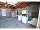 Garage with washer, dryer, and extra storage space at 1360 Prescott S St, St Petersburg, FL 33712