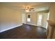 Spacious living room with dark brown wood-look floors and fireplace at 1360 Prescott S St, St Petersburg, FL 33712