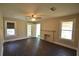 Living room featuring hardwood floors and a fireplace at 1360 Prescott S St, St Petersburg, FL 33712