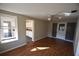 Spacious living room with hardwood floors and ceiling fan at 1360 Prescott S St, St Petersburg, FL 33712