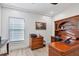 Home office with wood desk and built-in hutch at 1750 Jamaica Way # 0234, Punta Gorda, FL 33950