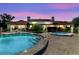 Relaxing community pool and hot tub area, perfect for leisure and recreation after sunset at 1808 Cypress Trace Dr # 1808, Safety Harbor, FL 34695