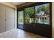 Enclosed Florida Room with views of pool area at 1808 Cypress Trace Dr # 1808, Safety Harbor, FL 34695