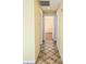 Clean hallway with tile flooring leading to other rooms at 1808 Cypress Trace Dr # 1808, Safety Harbor, FL 34695