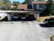 Covered parking area with space for three vehicles at 1808 Cypress Trace Dr # 1808, Safety Harbor, FL 34695