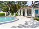 A poolside cabana provides shade and seating, enhancing the community's amenities at 1808 Cypress Trace Dr # 1808, Safety Harbor, FL 34695
