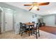 Charming dining area features seating for four, light walls, and views into the living room at 1900 60Th N Way, St Petersburg, FL 33710