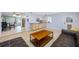 Open living room with tile flooring connecting to dining and kitchen areas at 1900 60Th N Way, St Petersburg, FL 33710