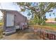 View of backyard with patio furniture and shed at 2045 18Th S Ave, St Petersburg, FL 33712
