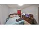 Bright bedroom with a double bed and dark wood dresser at 2045 18Th S Ave, St Petersburg, FL 33712