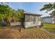 Charming bungalow home with a sunroom and landscaped yard at 2045 18Th S Ave, St Petersburg, FL 33712