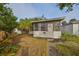 Front view of small house with lawn at 2045 18Th S Ave, St Petersburg, FL 33712