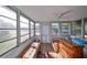 Sunroom with multiple windows and a view of the yard at 2045 18Th S Ave, St Petersburg, FL 33712