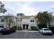 Two-story townhouse exterior with parking spaces at 2302 Maki Rd # 62, Plant City, FL 33563