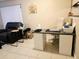 Home office space with desk and chair near the kitchen at 2302 Maki Rd # 62, Plant City, FL 33563