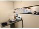 Small kitchen with granite countertop and white appliances at 2302 Maki Rd # 62, Plant City, FL 33563