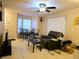 Living room with seating, bay window, and a coffee table at 2302 Maki Rd # 62, Plant City, FL 33563