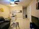Living room with comfortable seating and a kitchenette at 2302 Maki Rd # 62, Plant City, FL 33563