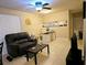 Living room featuring comfortable seating and a small workspace at 2302 Maki Rd # 62, Plant City, FL 33563