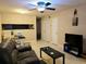 Living room with seating, coffee table, and a dining area at 2302 Maki Rd # 62, Plant City, FL 33563