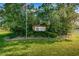 Lakeside Village entrance sign with American flag at 3900 107Th N Ave, Clearwater, FL 33762