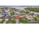 Aerial view of waterfront neighborhood with houses and pools at 4740 114Th N St, St Petersburg, FL 33708