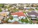 Aerial view of house with red roof and pool at 4740 114Th N St, St Petersburg, FL 33708
