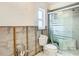 A partially renovated bathroom with a toilet and shower at 4740 114Th N St, St Petersburg, FL 33708