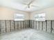 Room currently under renovation with exposed walls and flooring at 4740 114Th N St, St Petersburg, FL 33708
