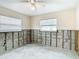 Room under reconstruction, showing new window and exposed walls at 4740 114Th N St, St Petersburg, FL 33708