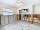 Renovation in progress, shows a bedroom with exposed walls and flooring at 4740 114Th N St, St Petersburg, FL 33708