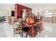 Dining Room with furnishings stacked, showing damage and repairs in progress at 4740 114Th N St, St Petersburg, FL 33708