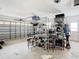 Garage with various storage items and shelving units at 4740 114Th N St, St Petersburg, FL 33708