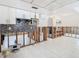 View of kitchen during renovations, showing water damage and exposed framing at 4740 114Th N St, St Petersburg, FL 33708
