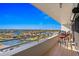 Balcony with water view and seating for two at 5950 Pelican Bay S Plz # Ph-2D, St Petersburg, FL 33707