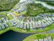 Aerial view showcasing the home's curb appeal and desirable neighborhood at 7465 Yale Harbor Dr, Wesley Chapel, FL 33545