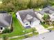 Aerial view of house and surrounding neighborhood at 7465 Yale Harbor Dr, Wesley Chapel, FL 33545