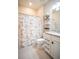 Clean bathroom with granite countertop and shower at 7465 Yale Harbor Dr, Wesley Chapel, FL 33545