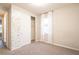 Bright bedroom with carpeted floors and large closet at 7465 Yale Harbor Dr, Wesley Chapel, FL 33545