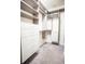 Large walk-in closet with built-in shelving and drawers at 7465 Yale Harbor Dr, Wesley Chapel, FL 33545