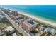 Aerial view of beachfront property and surrounding area at 1000 Gulf Blvd # 302, Indian Rocks Beach, FL 33785