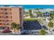 Aerial view of building, parking lot and oceanfront location at 1000 Gulf Blvd # 302, Indian Rocks Beach, FL 33785