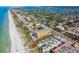 Aerial view of beachfront property, beach, and neighborhood at 1000 Gulf Blvd # 302, Indian Rocks Beach, FL 33785
