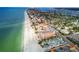 Aerial view showing beachfront property and surrounding neighborhood at 1000 Gulf Blvd # 302, Indian Rocks Beach, FL 33785