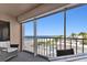 Balcony with ocean and pool views, patio furniture at 1000 Gulf Blvd # 302, Indian Rocks Beach, FL 33785