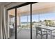Private balcony with ocean views and outdoor seating at 1000 Gulf Blvd # 302, Indian Rocks Beach, FL 33785