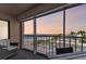 Relax on this home's balcony with ocean views and access to community tennis courts at 1000 Gulf Blvd # 302, Indian Rocks Beach, FL 33785