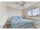 Bedroom with queen bed, ceiling fan, and ocean view at 1000 Gulf Blvd # 302, Indian Rocks Beach, FL 33785