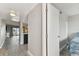 Hallway view of condo with kitchen and bedroom access at 1000 Gulf Blvd # 302, Indian Rocks Beach, FL 33785